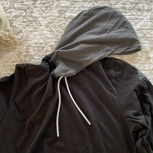 Men’s Adidas size SM black and gray sweatshirt.